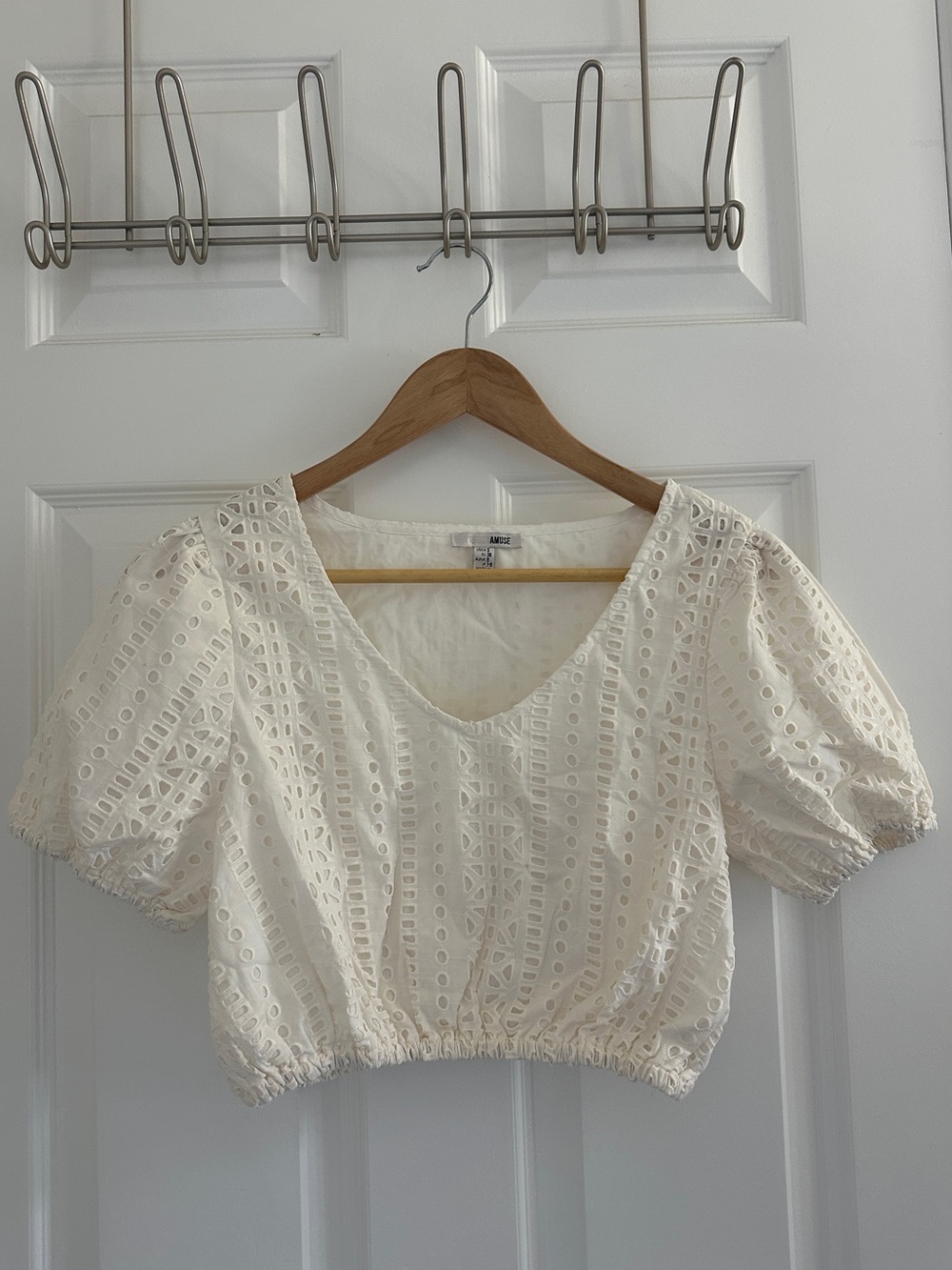 White eyelet blouse with puffy sleeves
